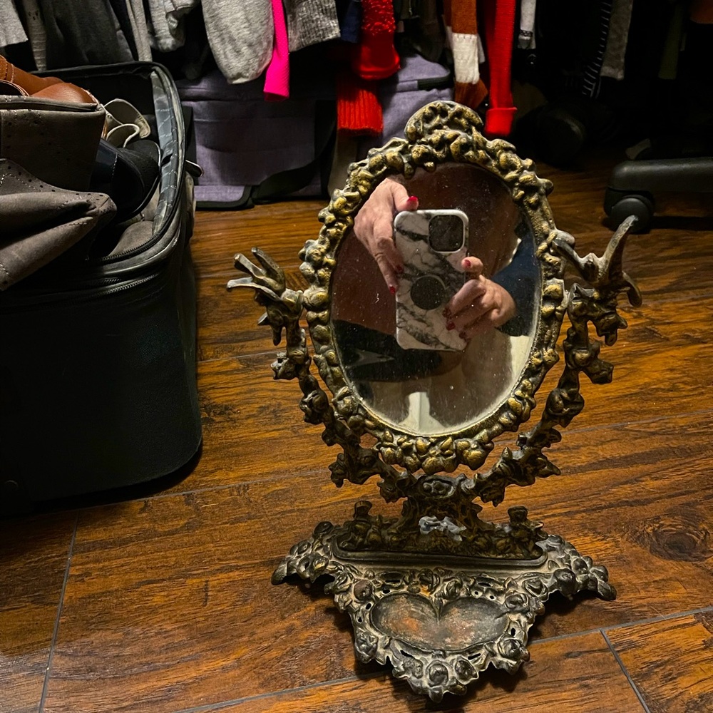 Antique mirror to put your earrings on or rings